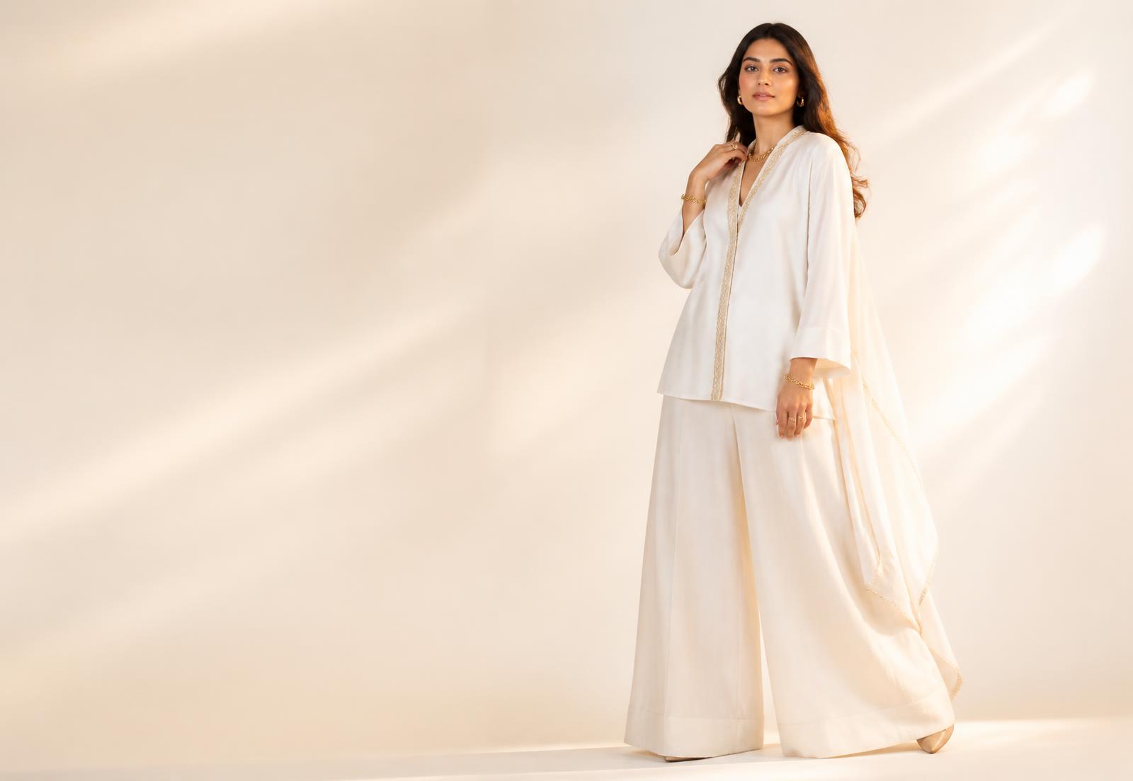 Model wearing an ivory Closet Crush co-ord set